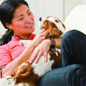 Asian woman with puppy.